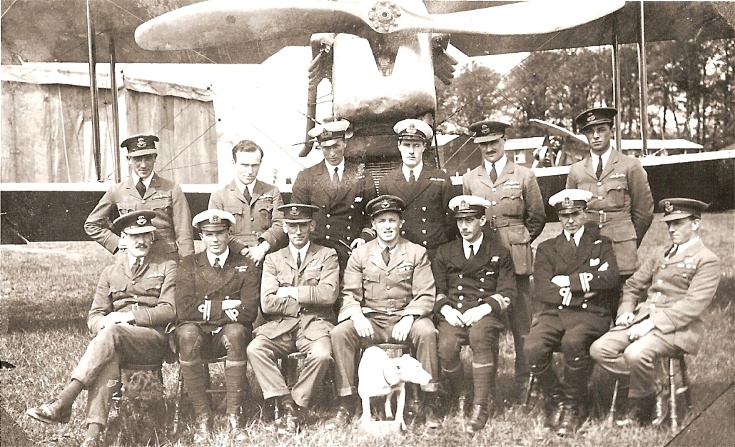 RAF and RN Officers in front of a Walrus aircraft