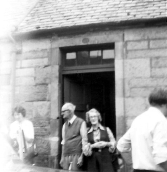 Grandad and Auntie Barbara in front of Ness Cottage