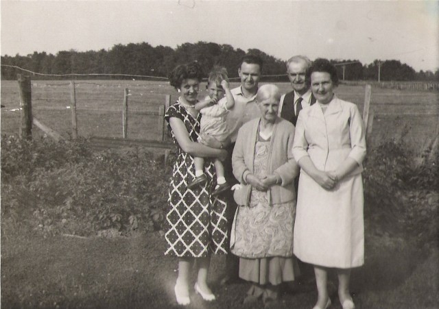 Angus Mackenzie with his mother and father